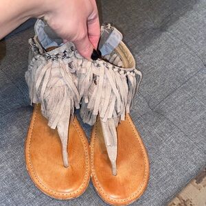 Not Rated, size 9.5, tan